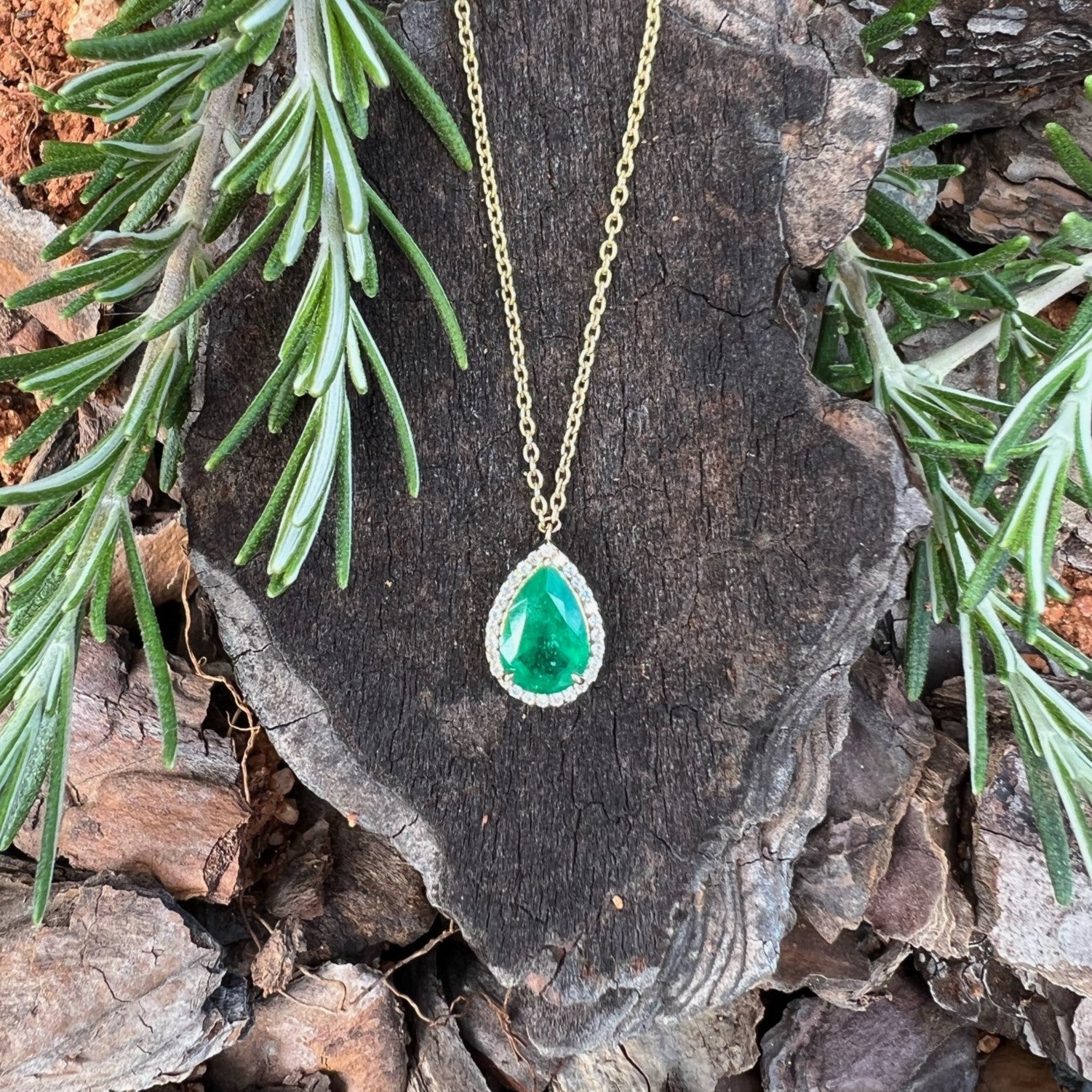 Emerald Pear Shape Halo Pendant - Eshli Fine Jewelry